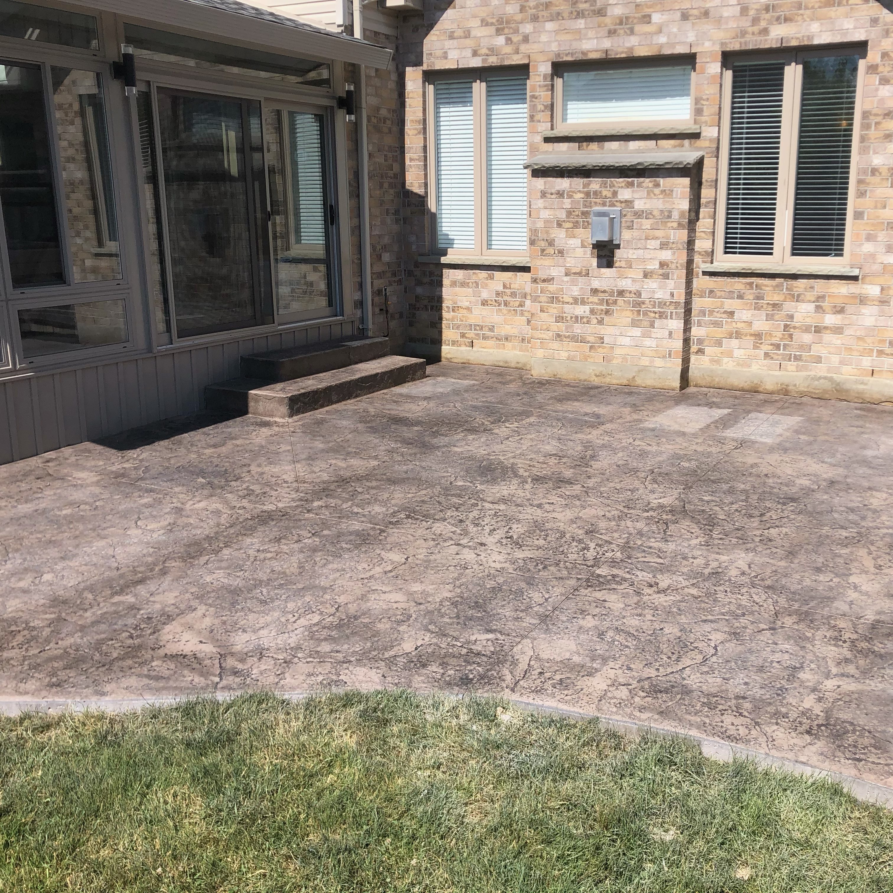 Rough Cut Stone Stamped Concrete Patio in London Ontario