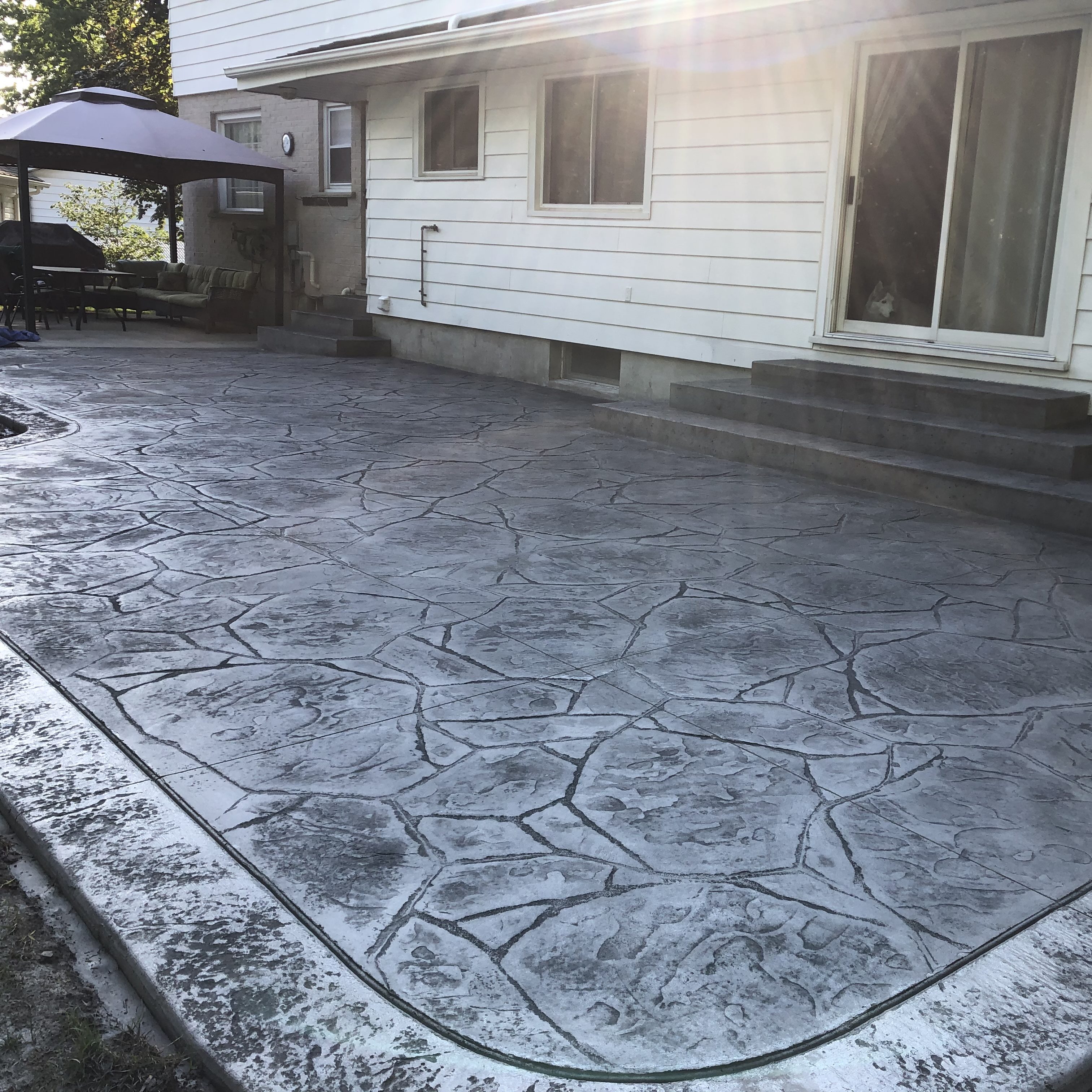 Arizona Flagstone Stamped Concrete Patio with Rough Cut Border in Woodstock Ontario