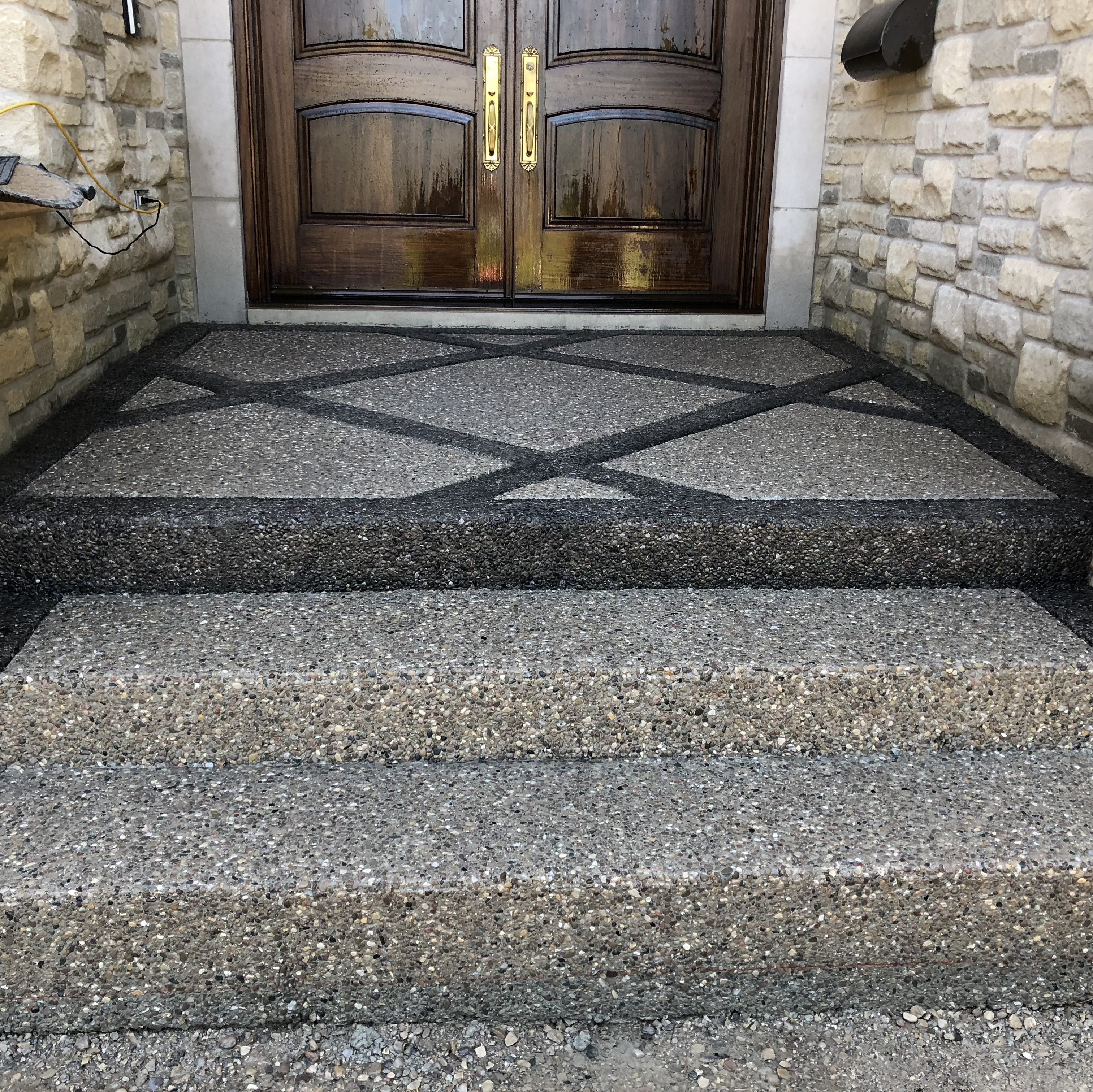 Exposed Aggregate Porch with Separate Borders in London Ontario