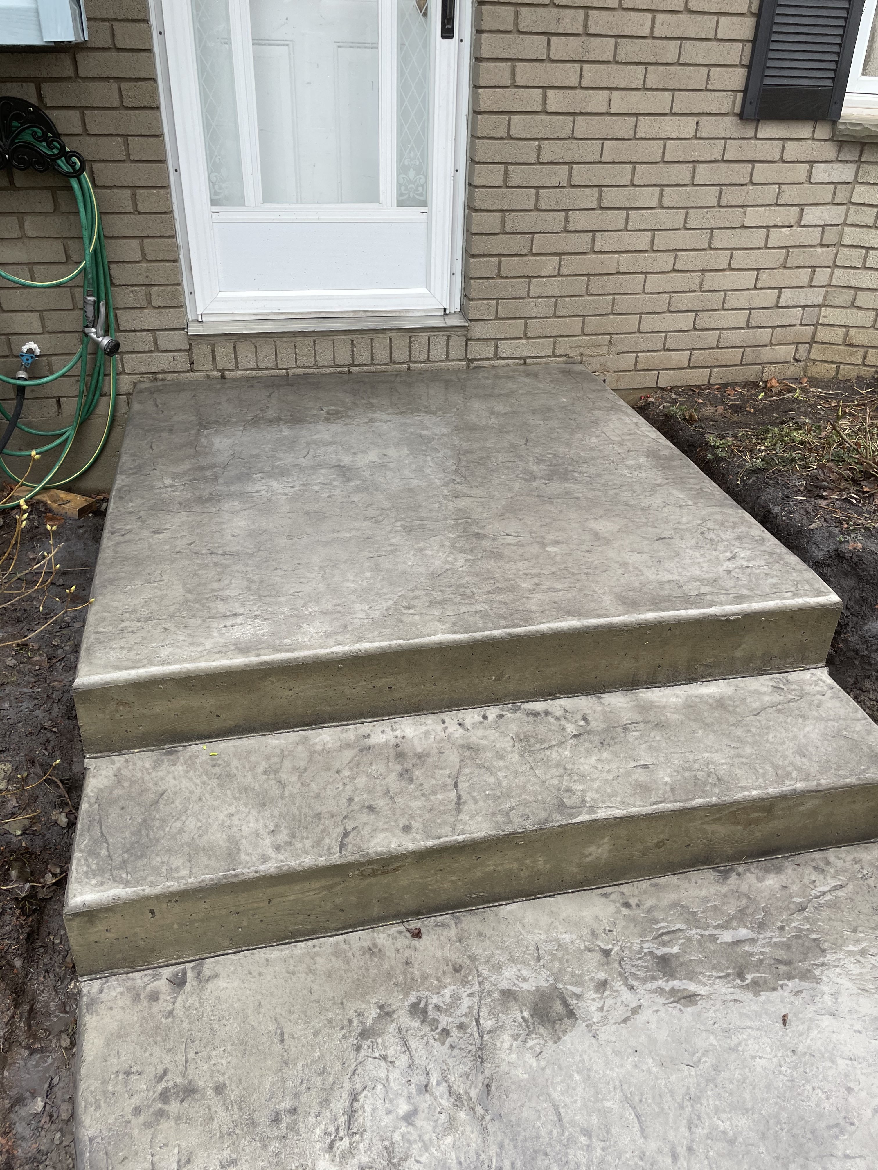 Smooth Slate Stamped Concrete Steps in London Ontario