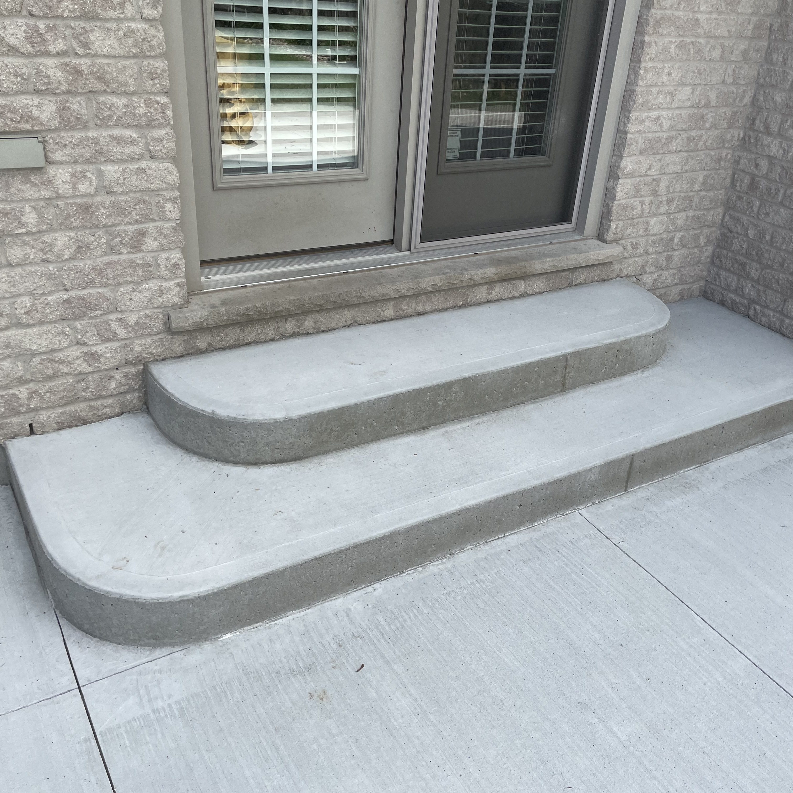 Brushed Concrete Steps with Rounded Corners in London Ontario