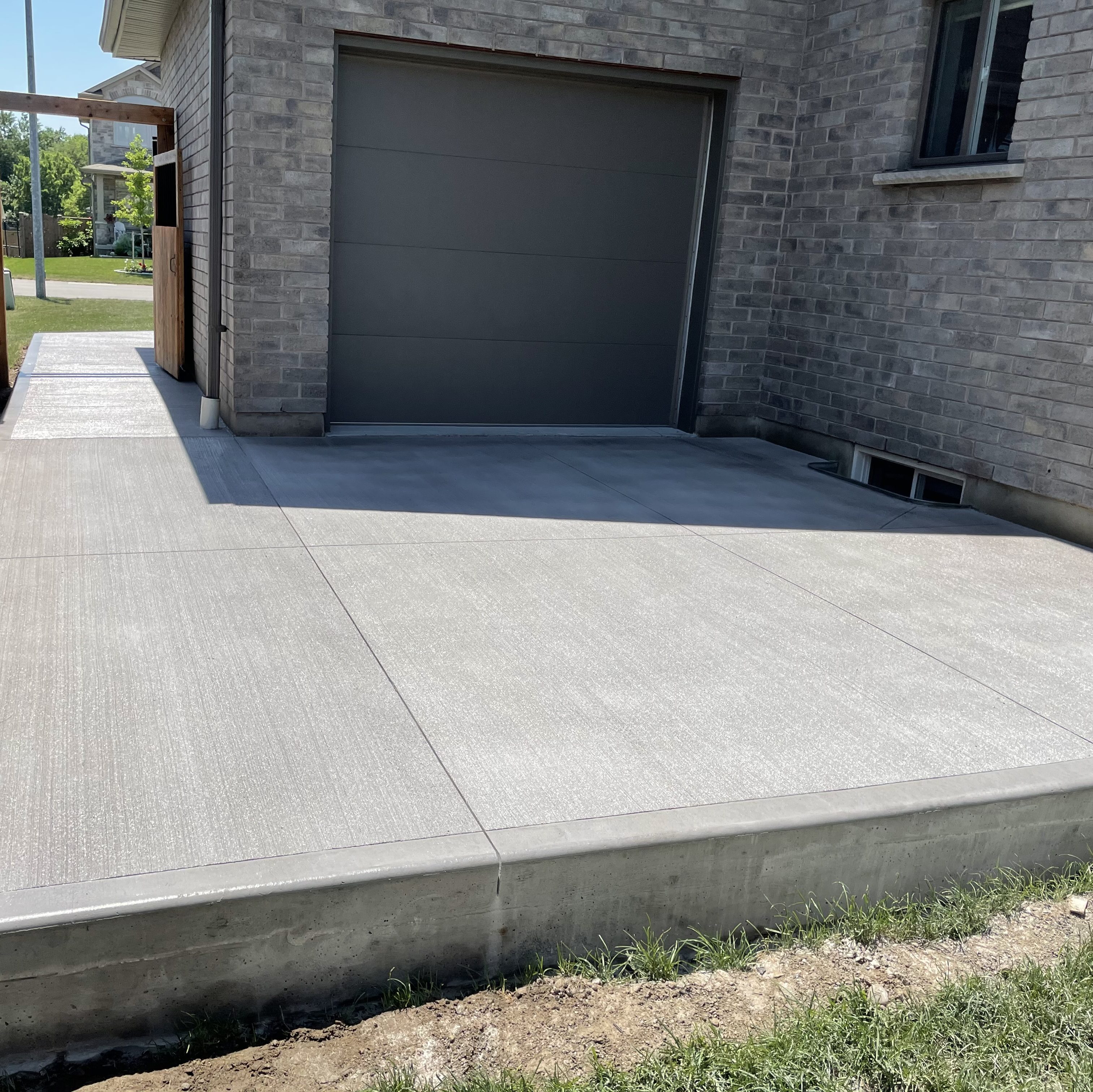 Brushed Concrete Patio in Thamesford Ontario