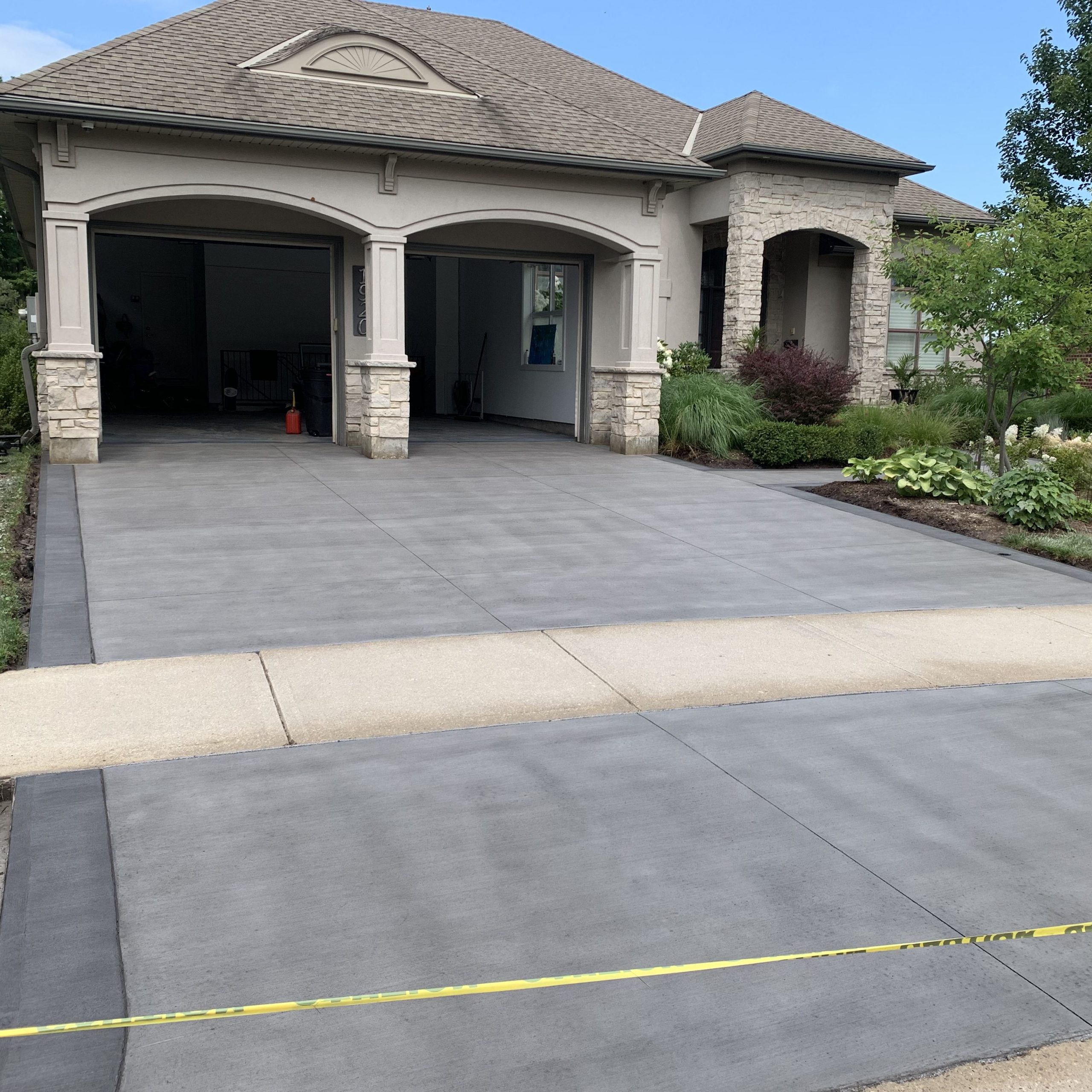 Brushed Concrete Driveway with Separate Border in London Ontario