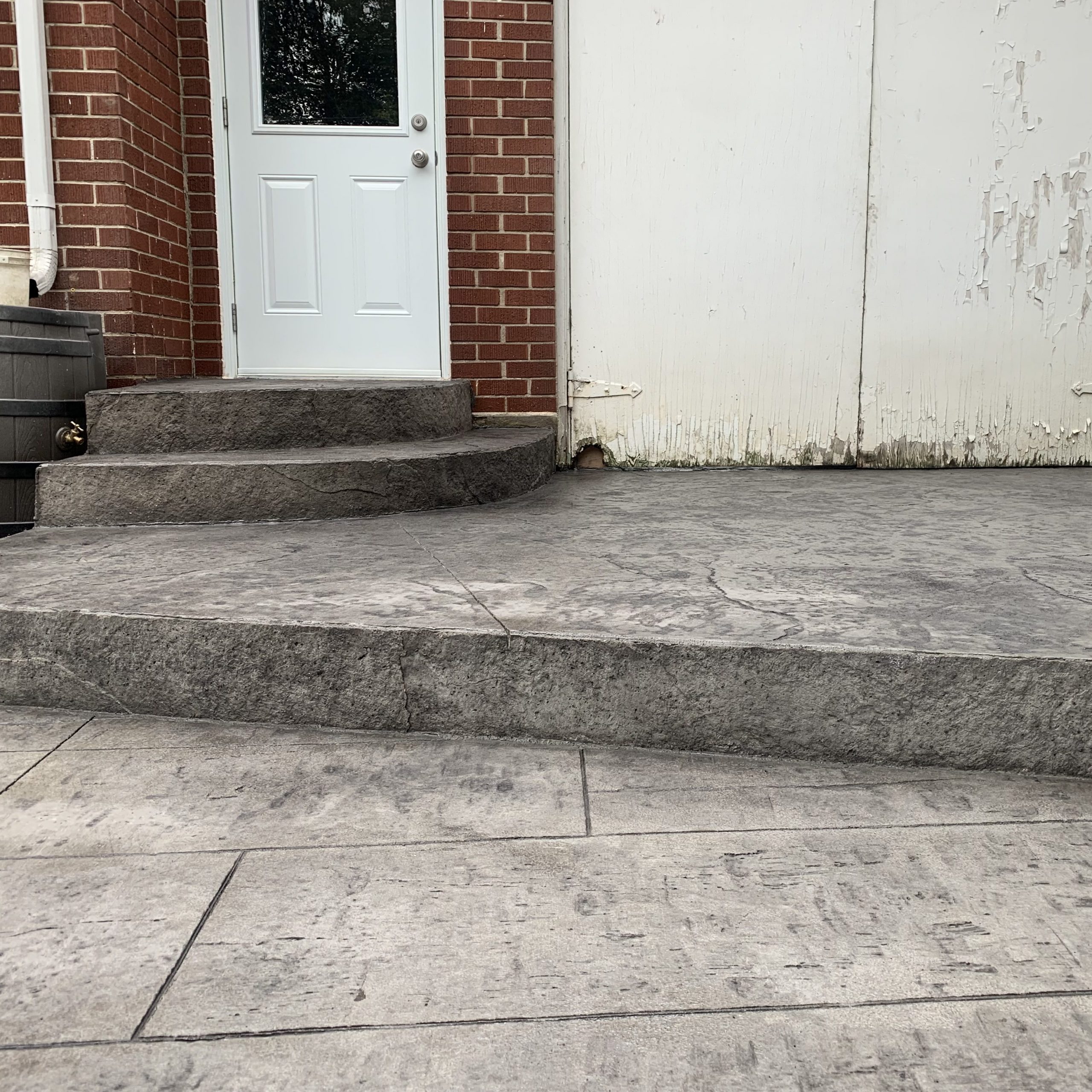 Rough Cut Stone Stamped Concrete Steps with Moulded Faces in London Ontario