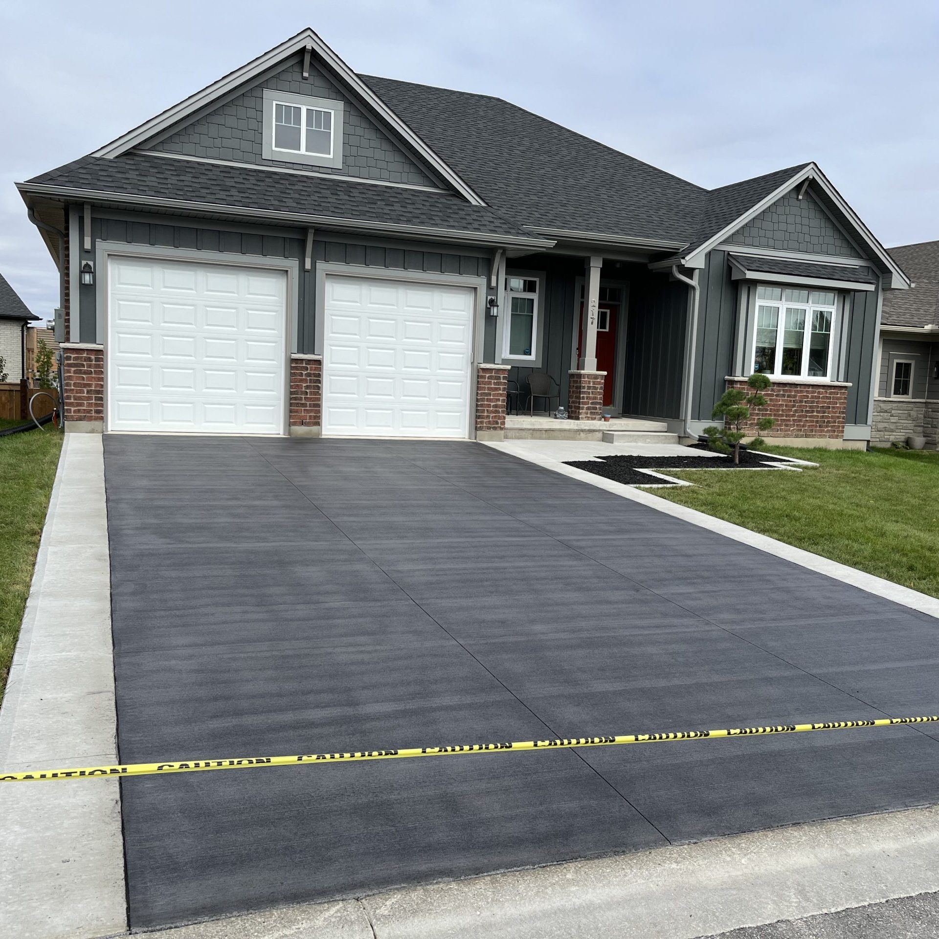 Brushed Concrete Driveway with Separate Borders in Strathroy Ontario