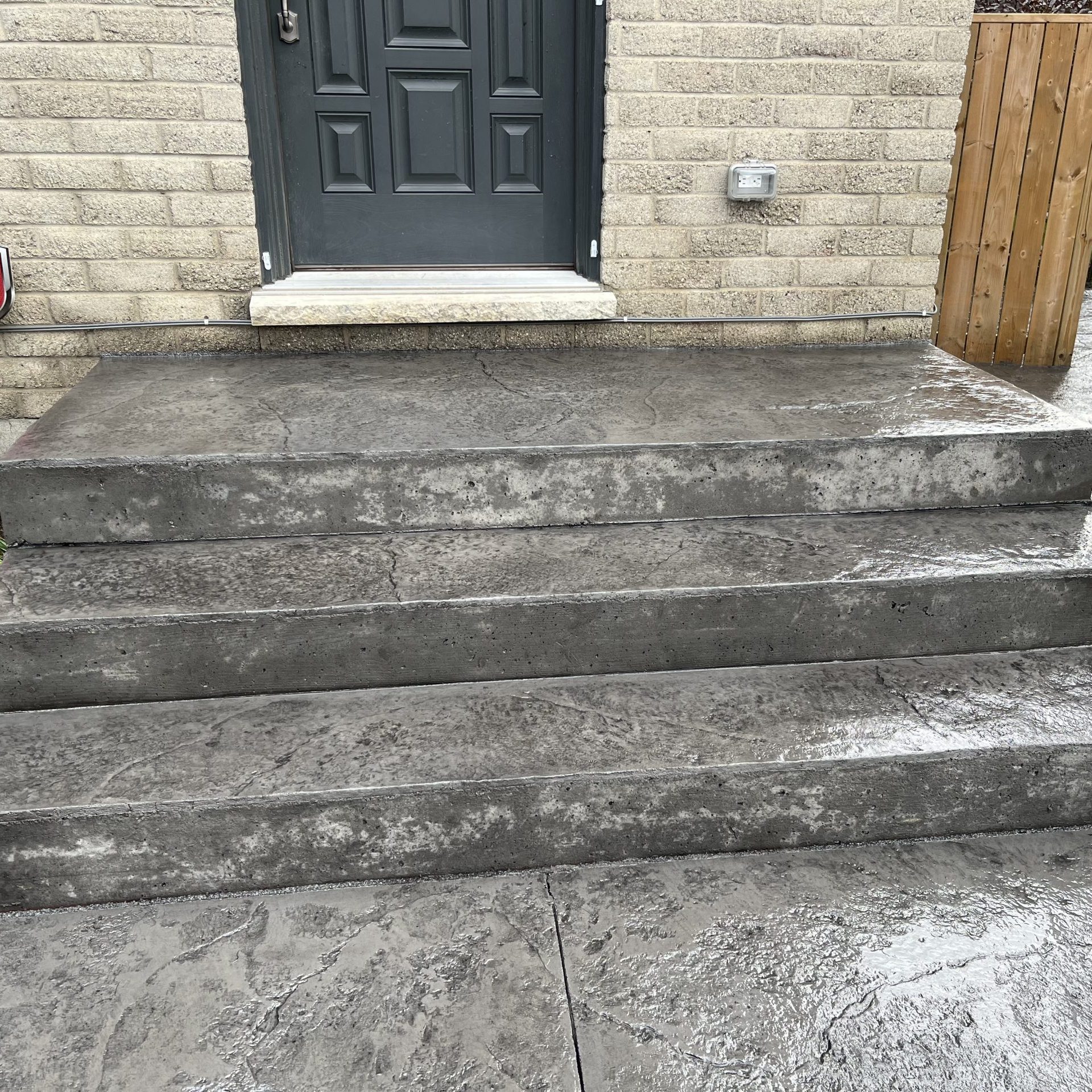 Rough Cut Stone Stamped Concrete Porch and Steps in London Ontario