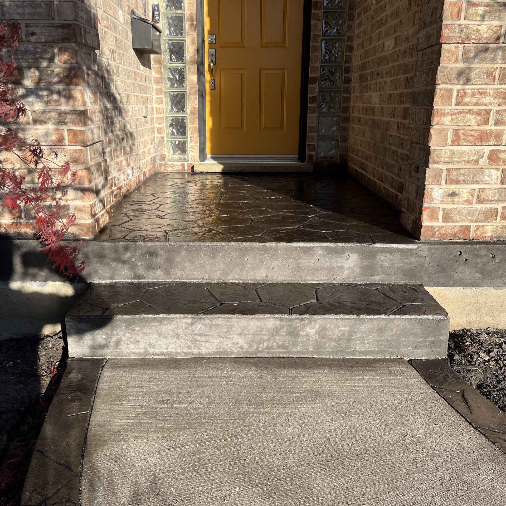 Random Stone Stamped Concrete Porch in London Ontario