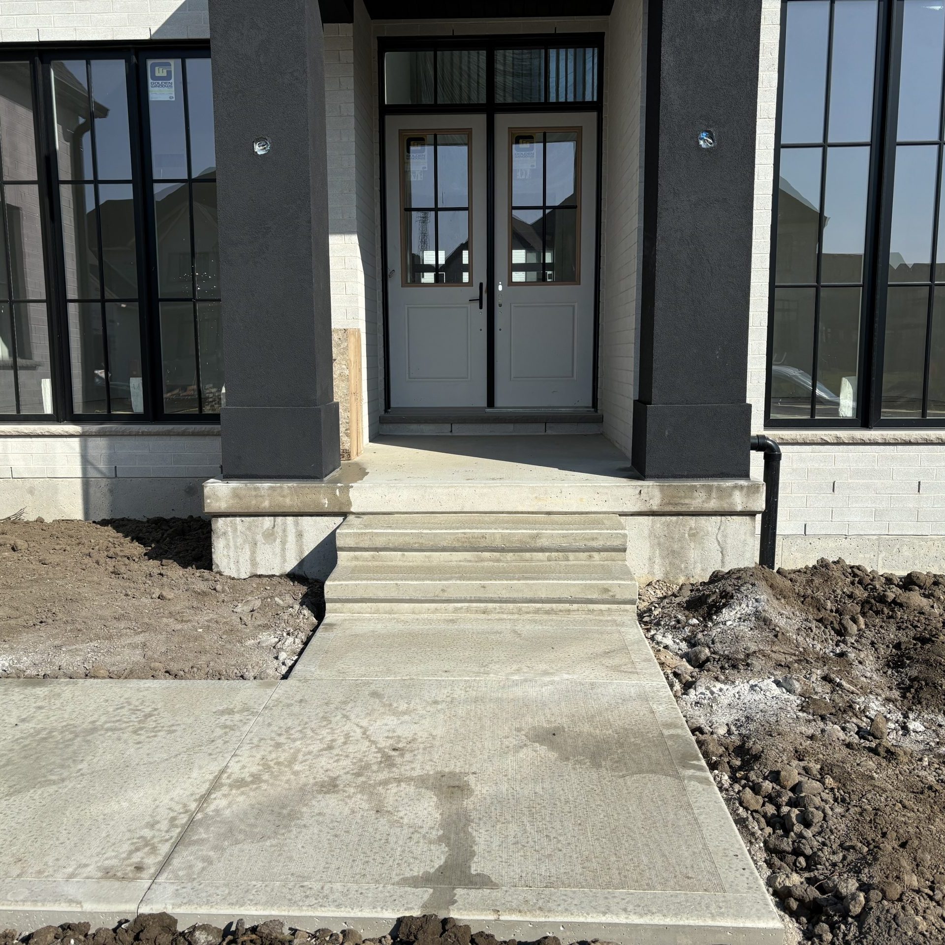 Brushed Concrete Steps with Bull Nose in London Ontario