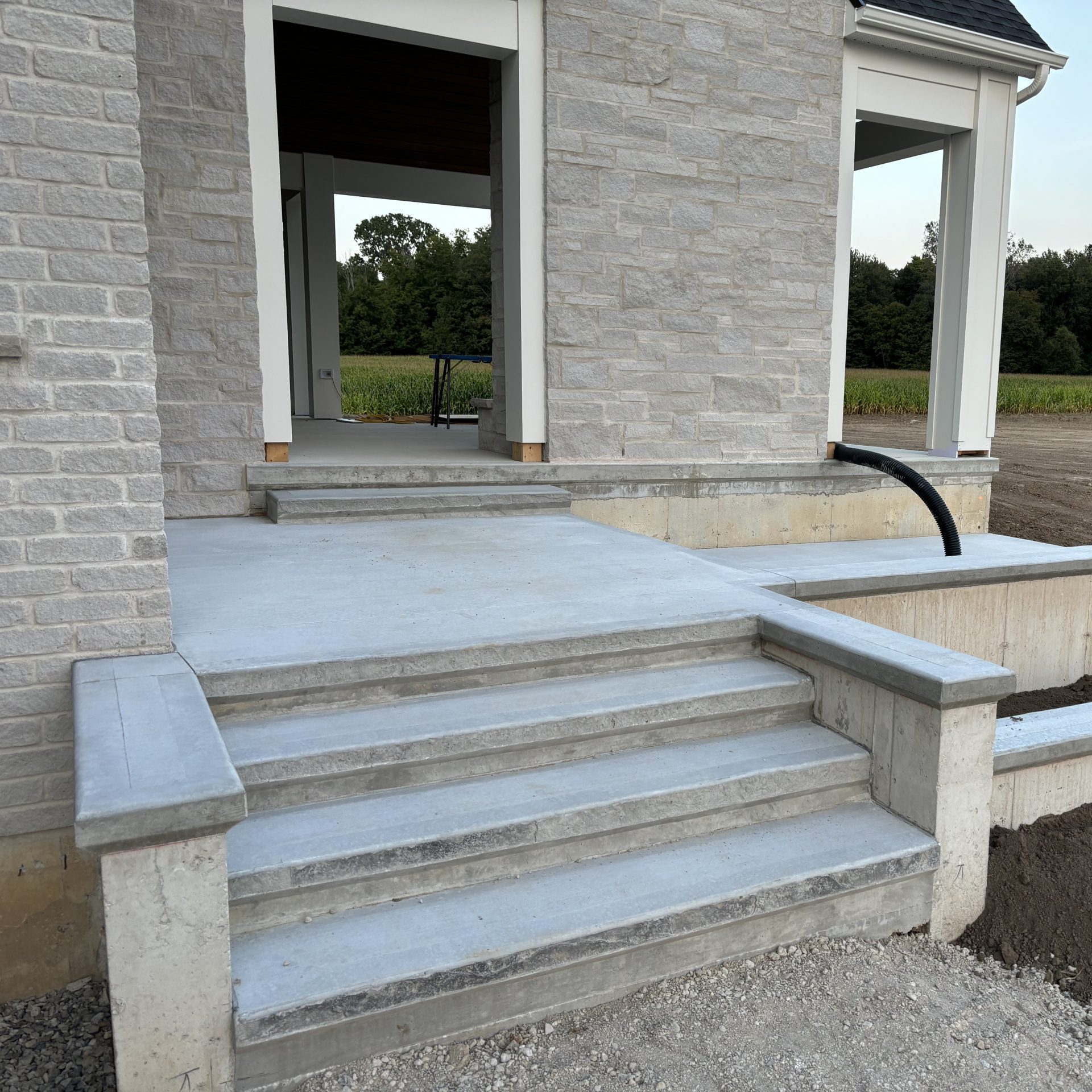 Brushed Concrete Steps with Moulded Bull Nose in Coldstream Ontario