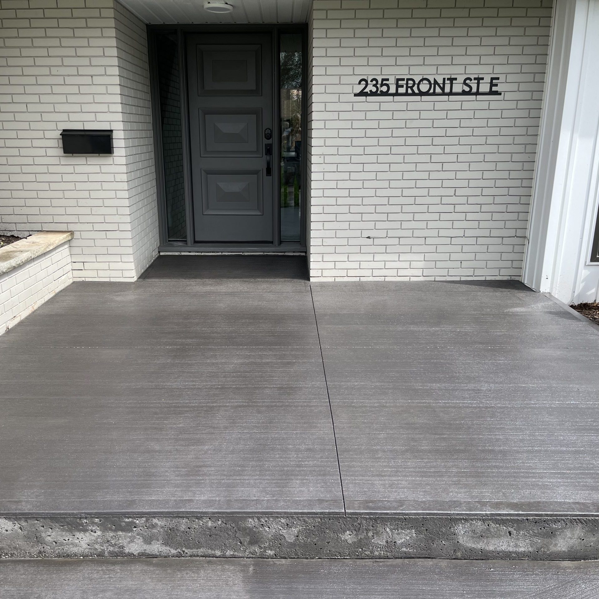 Brushed Concrete Porch in Strathroy Ontario