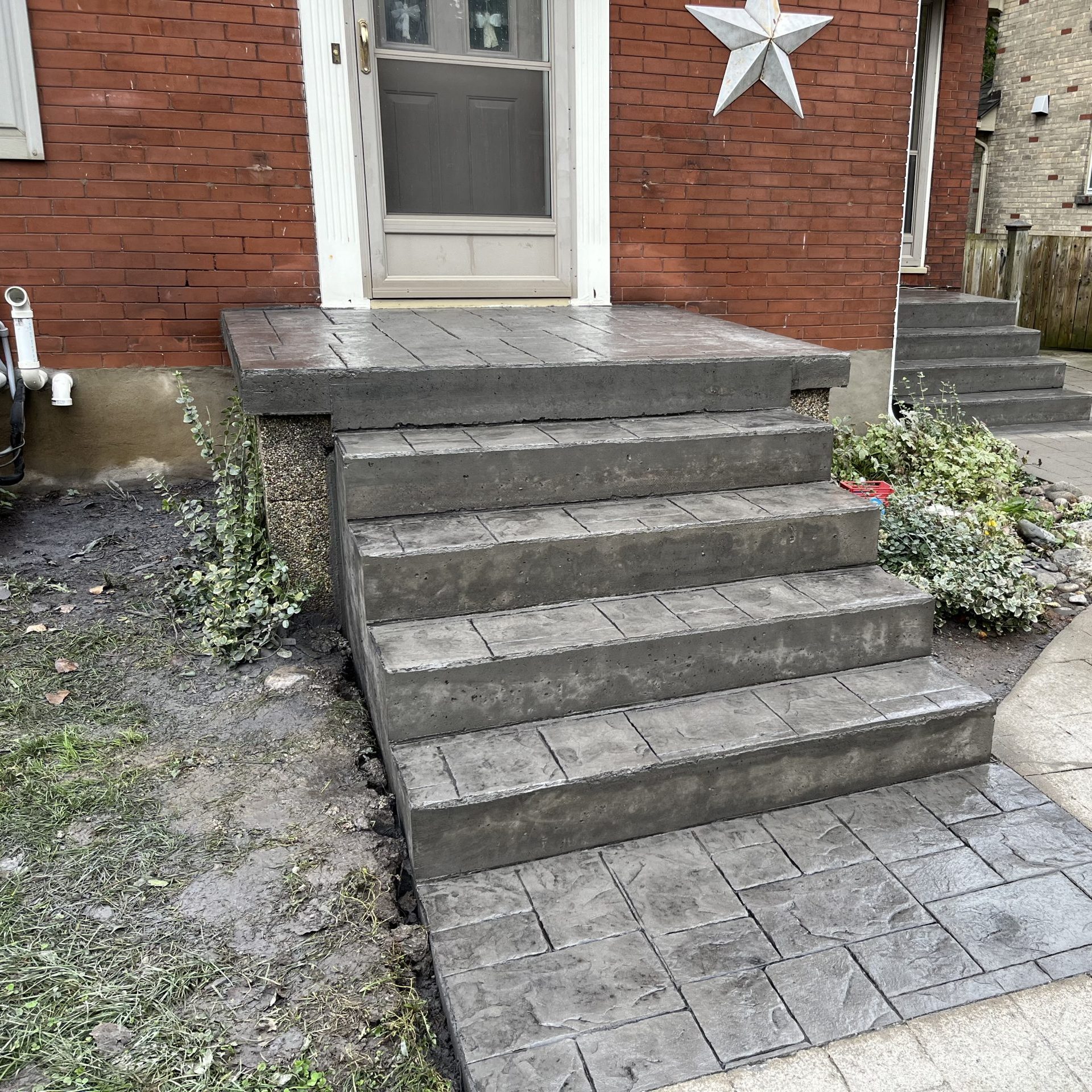 Small Ashlar Slate Stamped Concrete Porch in London Ontario