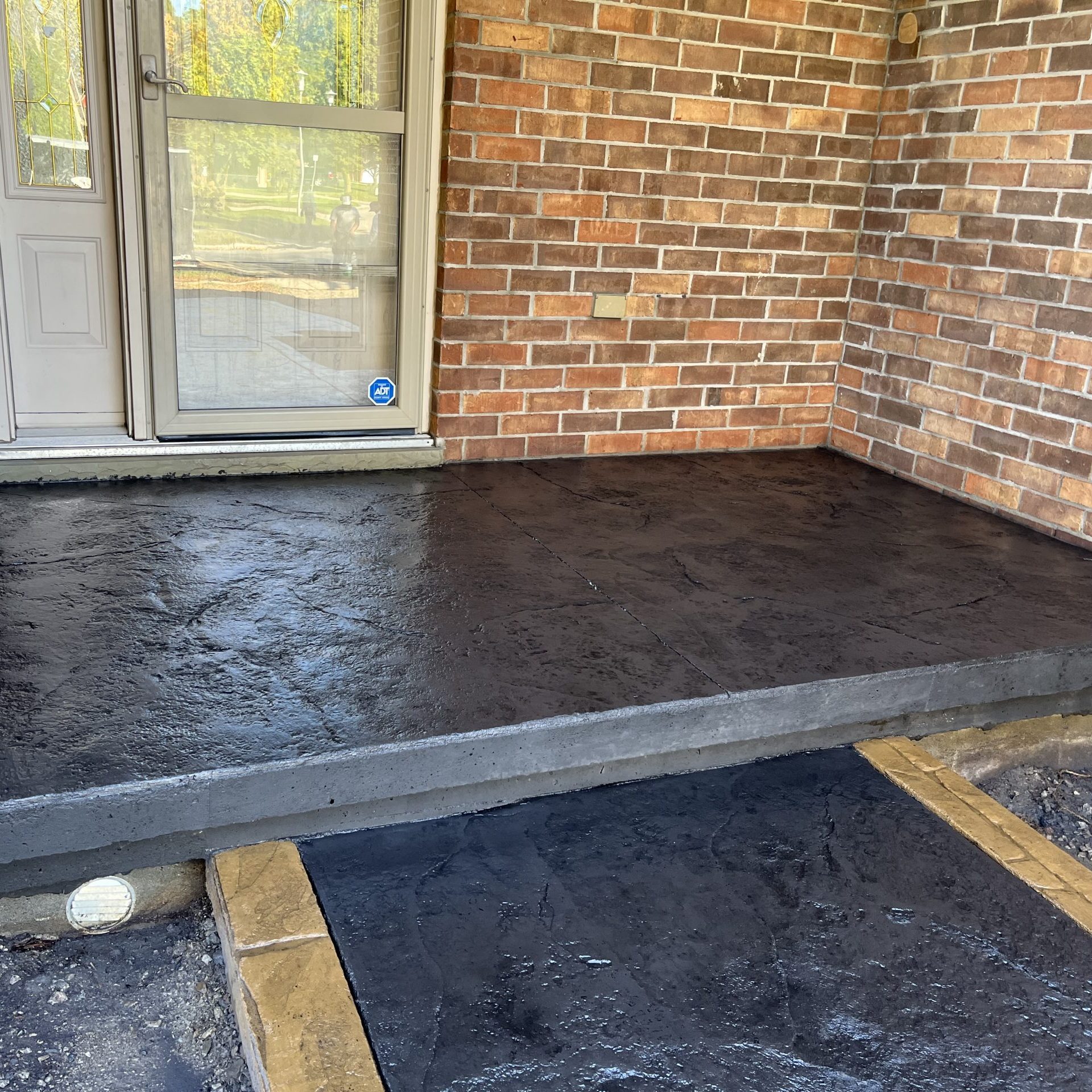 Rough Cut Stone Stamped Concrete Porch in London Ontario