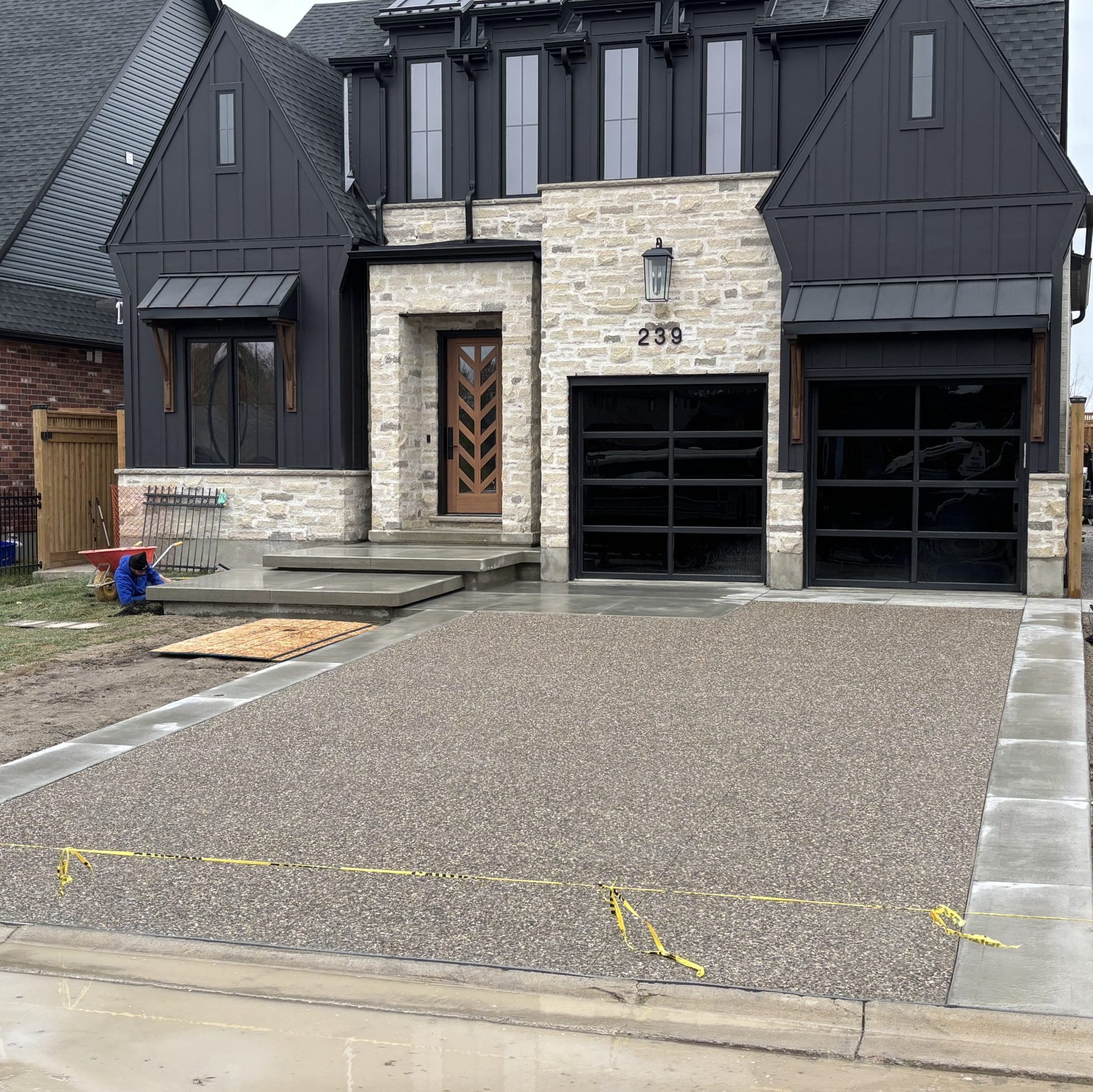 Exposed Aggregate Concrete Driveway with Brushed Borders in Thorndale Ontario