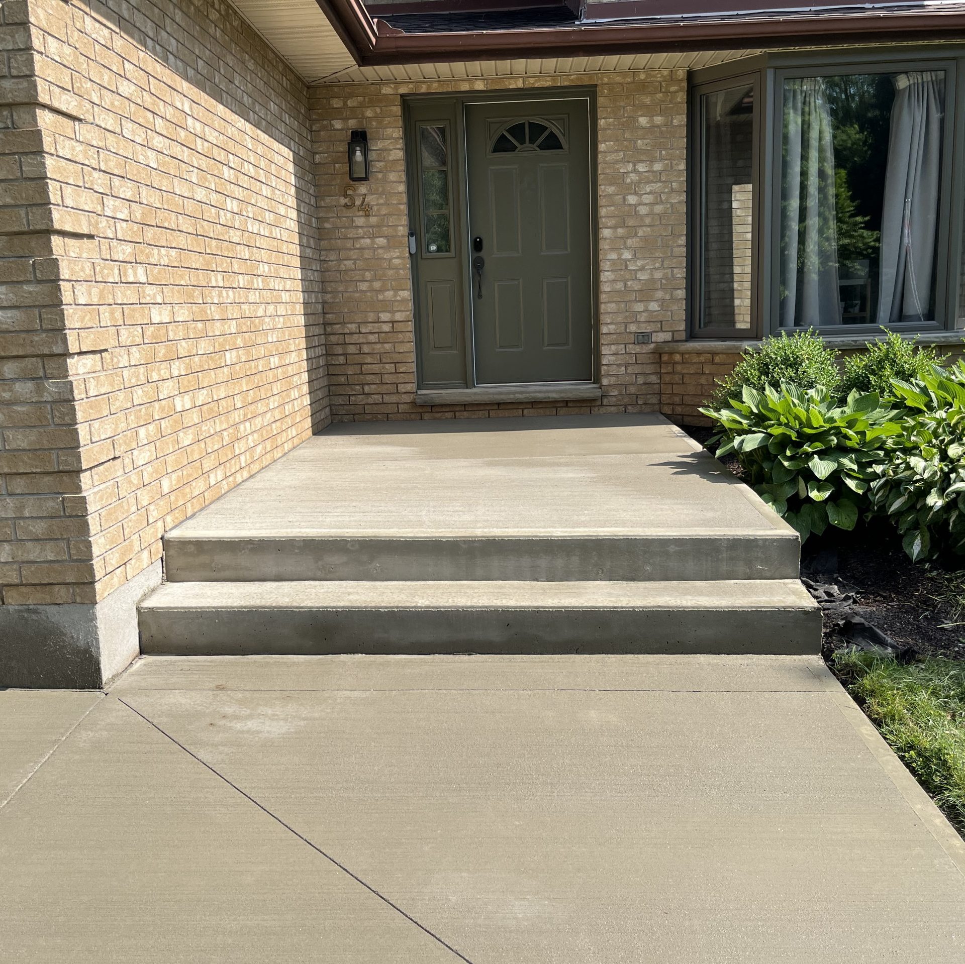 Brushed Concrete Porch in Delaware Ontario