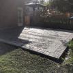 Rough Cut Stone Stamped Concrete Patio with Ashlar Border in London Ontario
