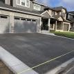 Exposed Aggregate Concrete Driveway with Brushed Borders in Woodstock Ontario