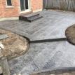 Wood Plank Stamped Concrete Patio with Rough Cut Border in Dorchester Ontario